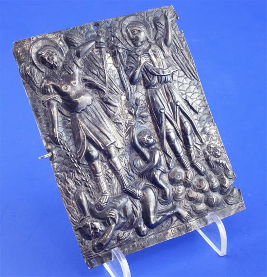 A 17th century byzantine embossed silver bible cover depicting St. Michael slaying the Devil, 4.75in.